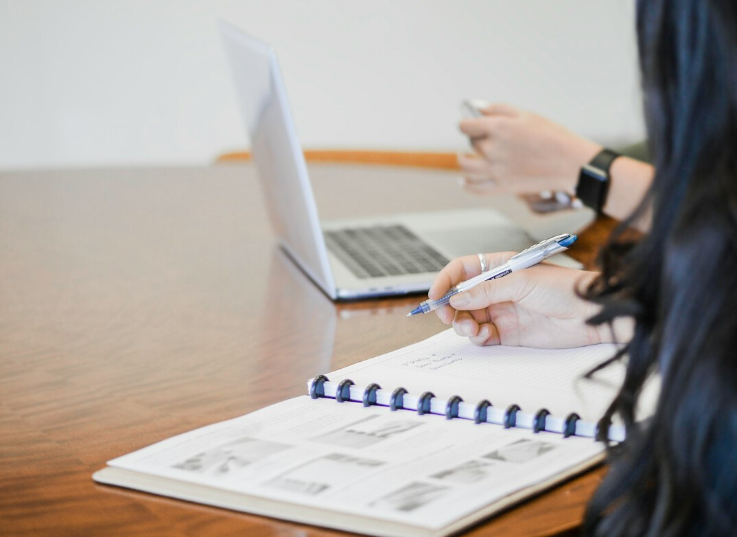 executive reviewing reports